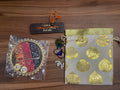 Return Gift Hamper - Tilak Thali 6 Inches, Hanuman Chalisa Wooden Work, Srinath Ji Brooch in a Potli