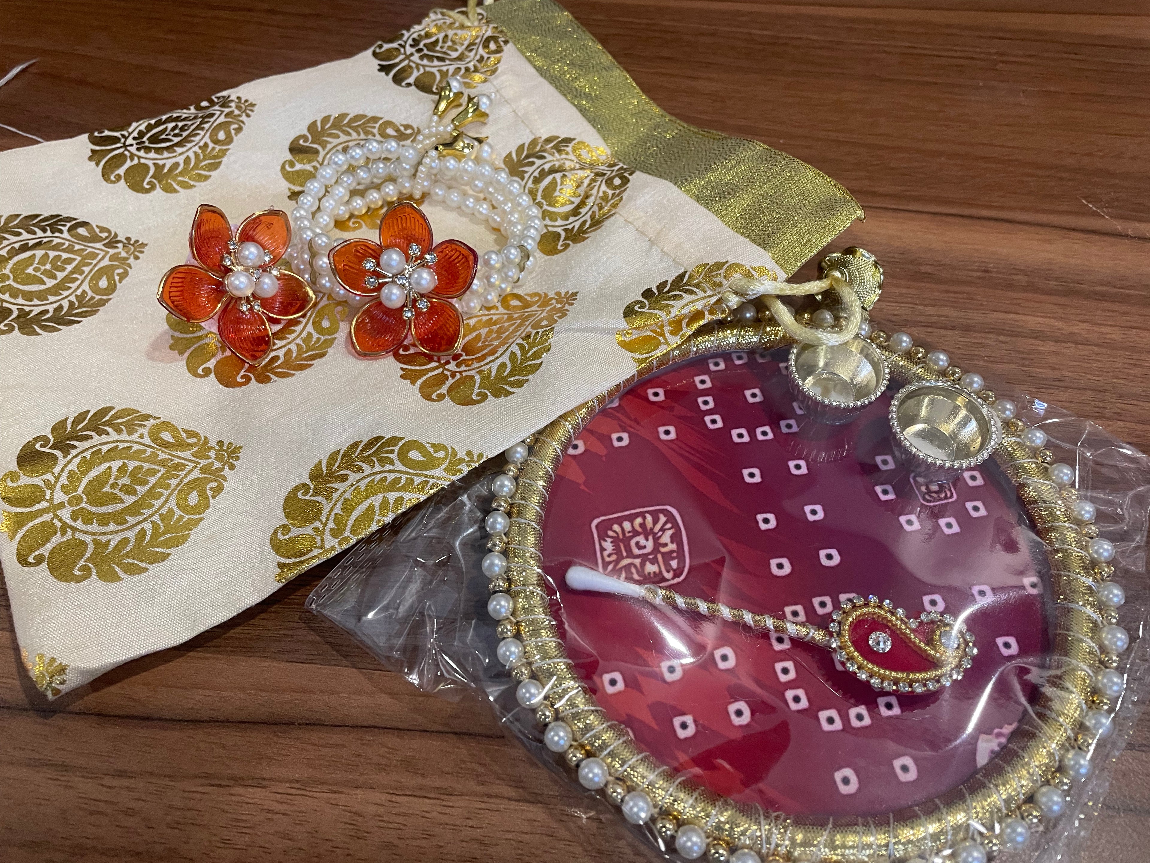 Tilak Thali Gift Hamper - Tilak Thali 6 Inches, Bracelet and Ring in a Potli