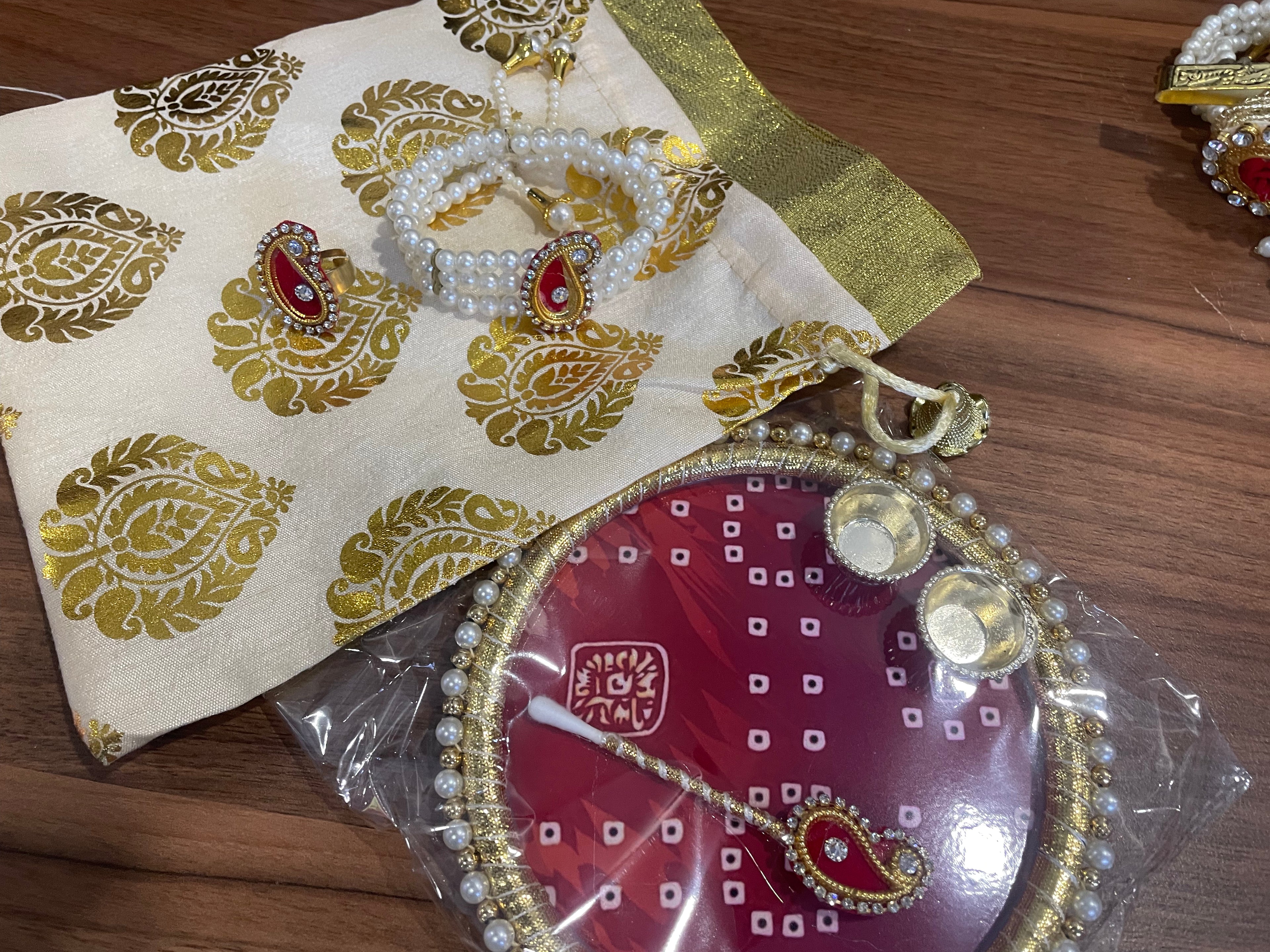 Tilak Thali Gift Hamper - Tilak Thali 6 Inches, Bracelet and Ring in a Potli