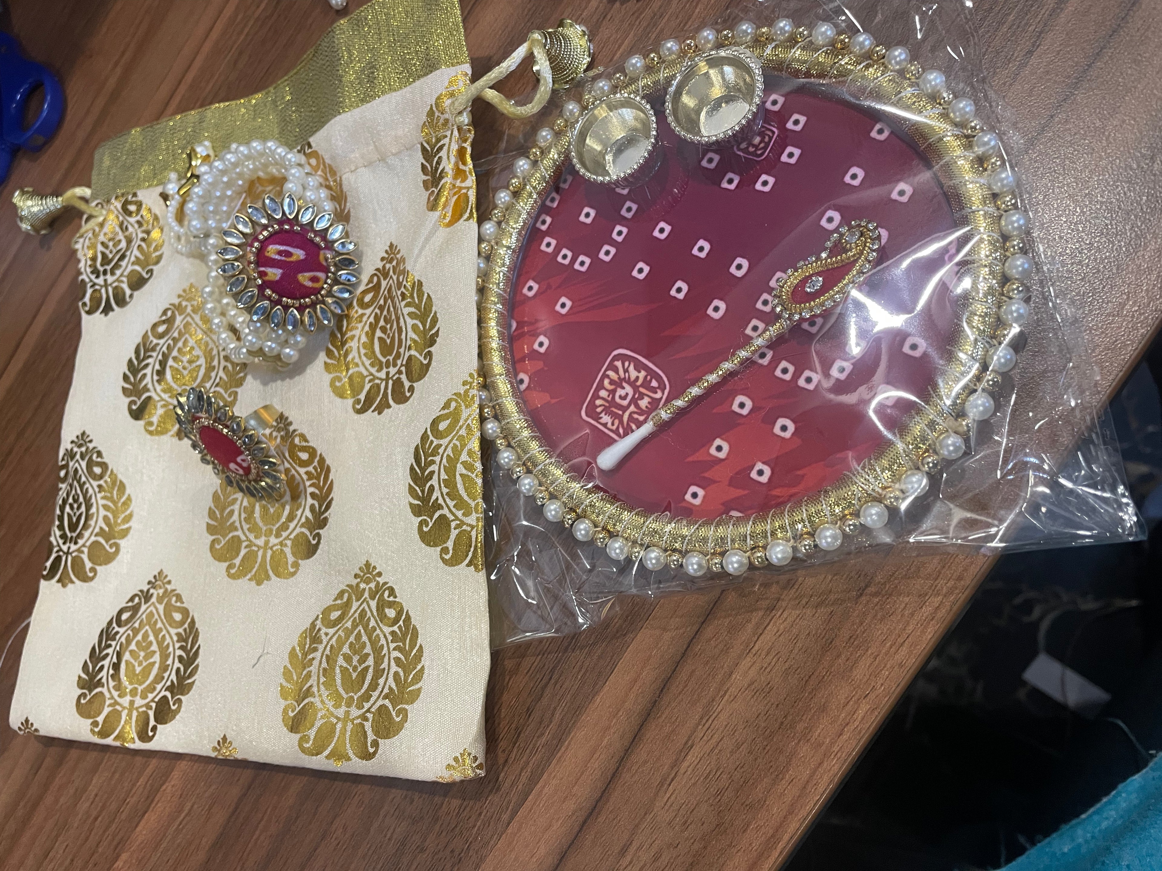 Tilak Thali Gift Hamper - Tilak Thali 6 Inches, Bracelet and Ring in a Potli