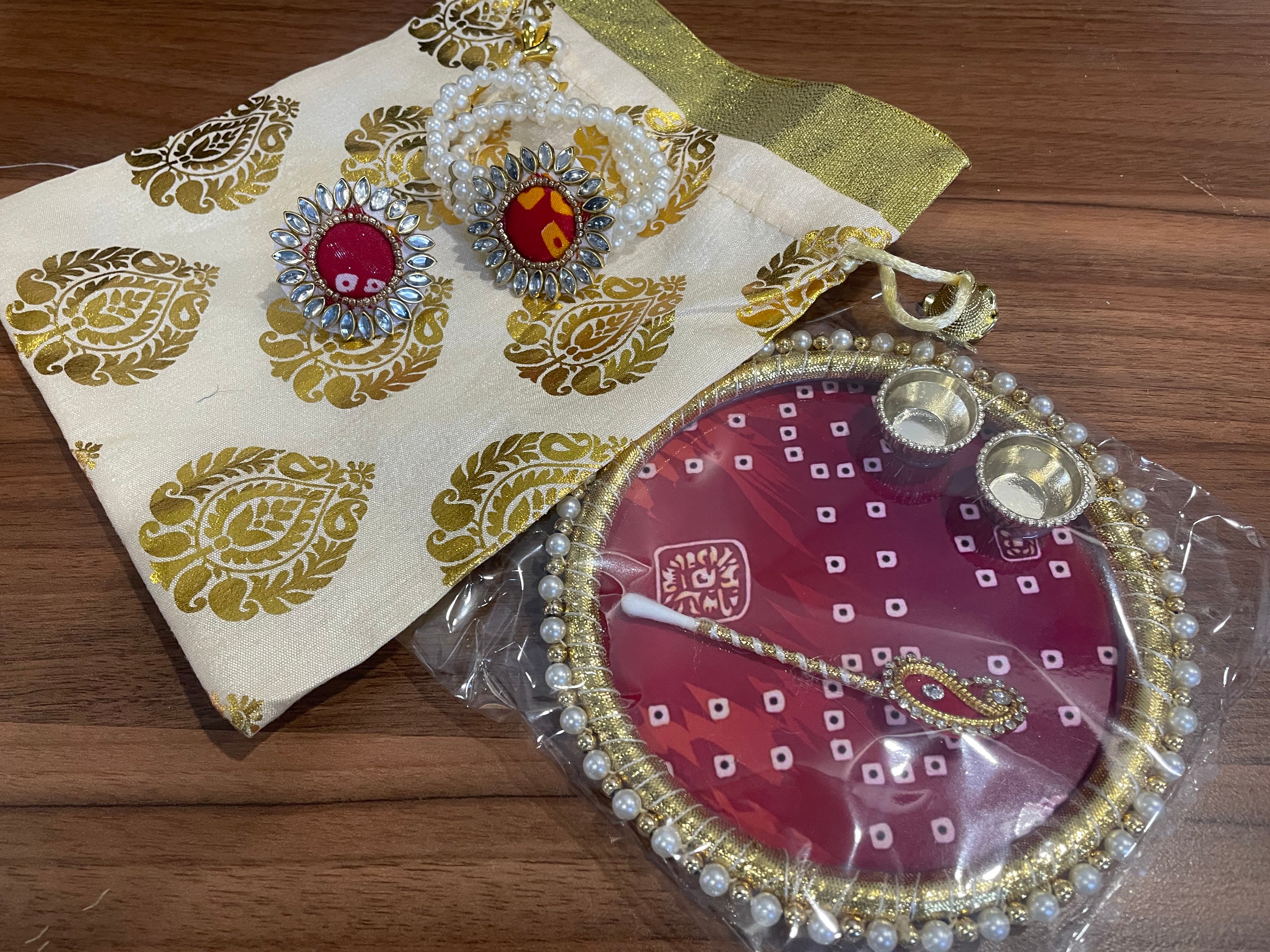 Tilak Thali Gift Hamper - Tilak Thali 6 Inches, Bracelet and Ring in a Potli