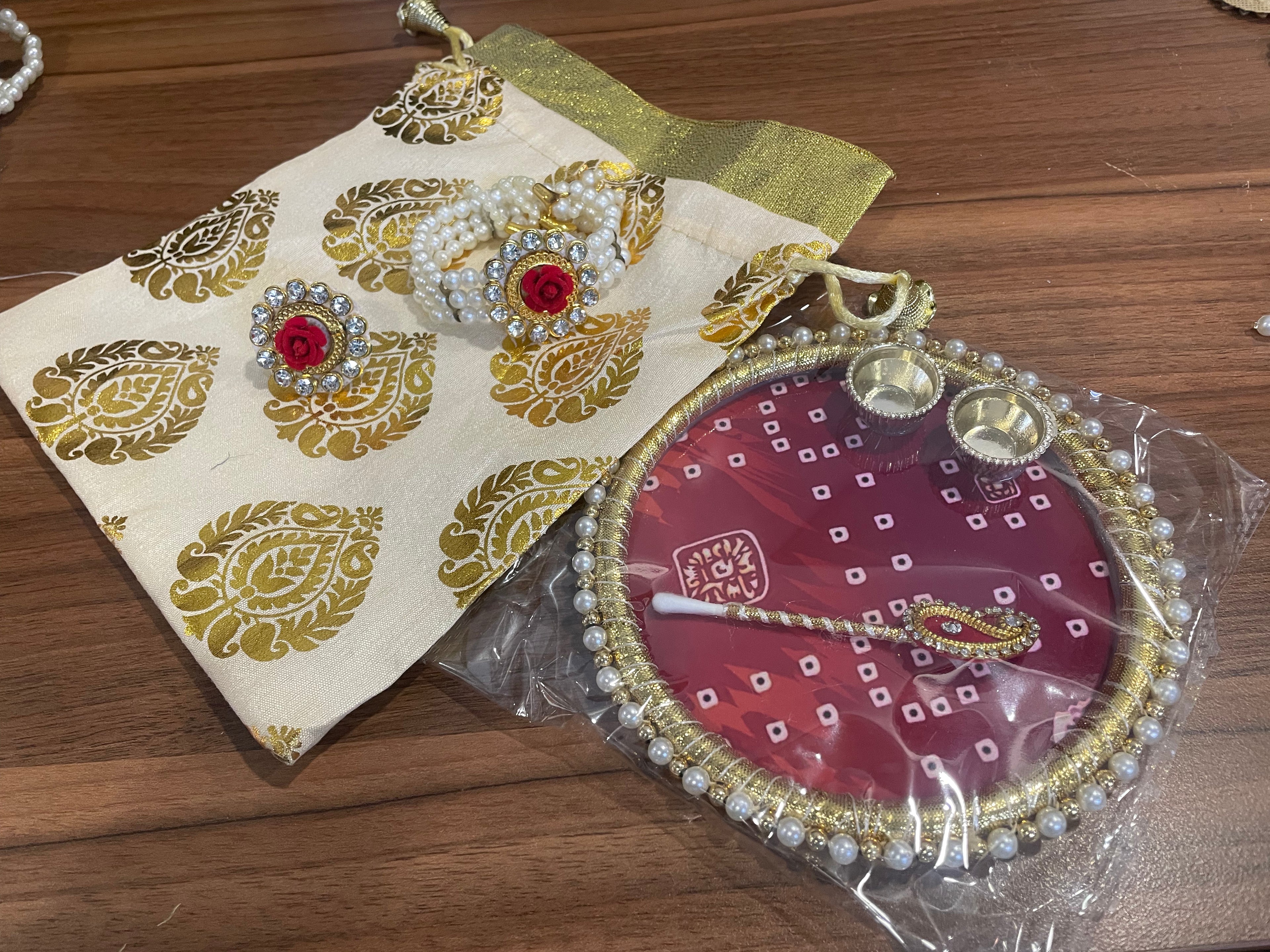 Tilak Thali Gift Hamper - Tilak Thali 6 Inches, Bracelet and Ring in a Potli
