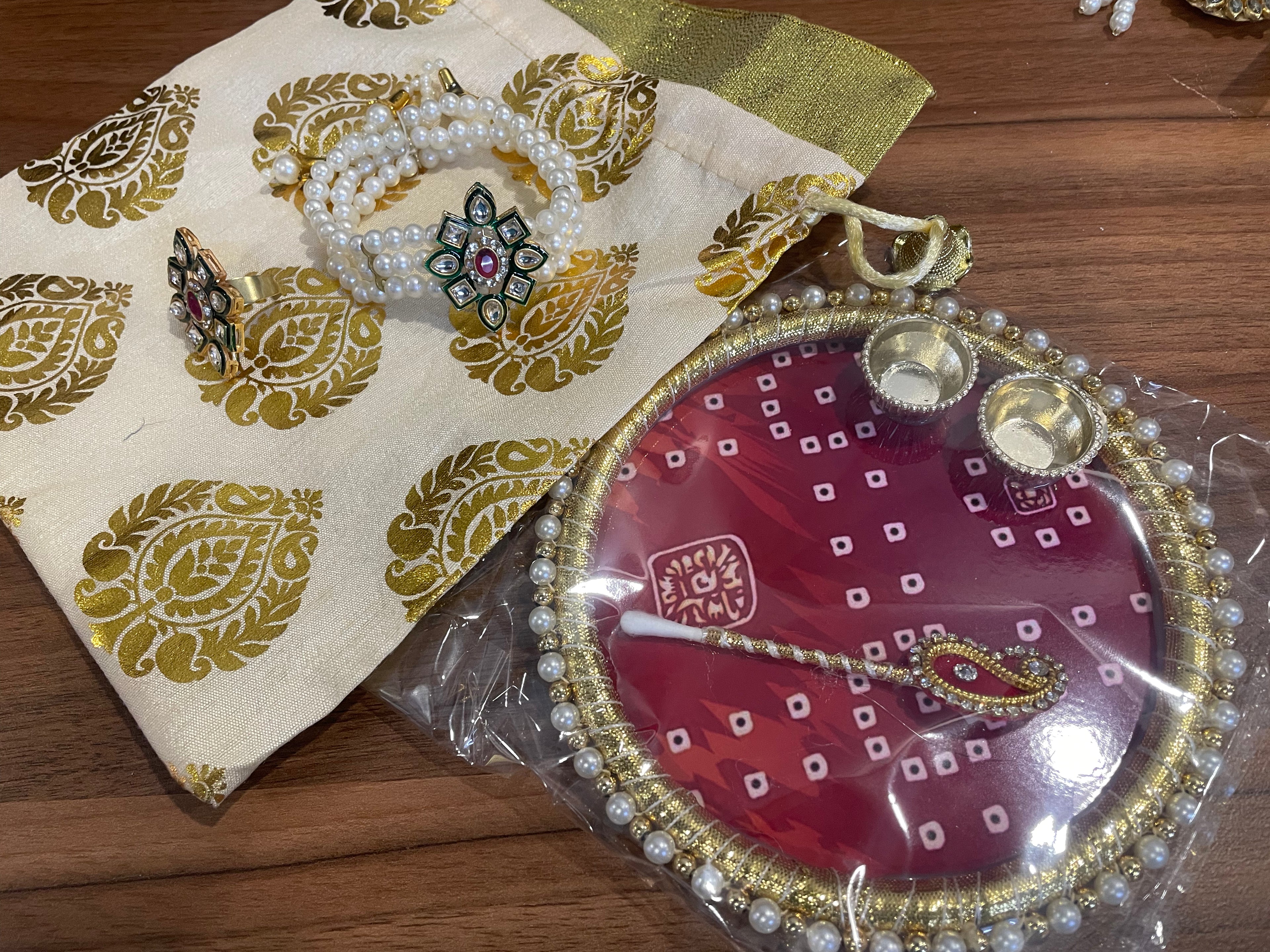 Tilak Thali Gift Hamper - Tilak Thali 6 Inches, Bracelet and Ring in a Potli
