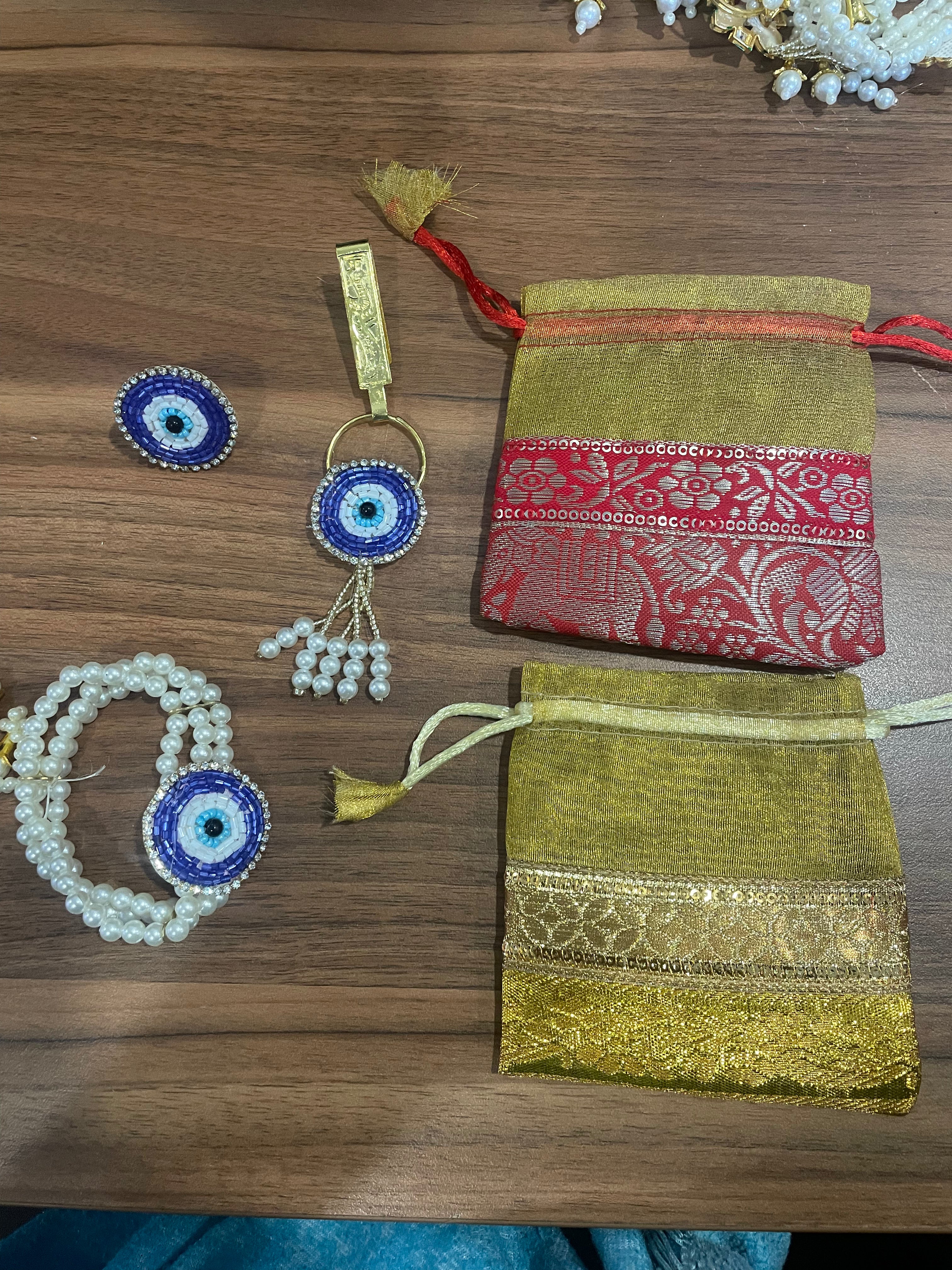 Return Gift Combo - Bracelet, Ring, Satka / Shyle Same Design in a Banarasi Potli